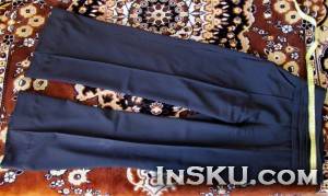 Женские чёрные расклёшенные брюки с высокой талией. Обзор на InSKU.com